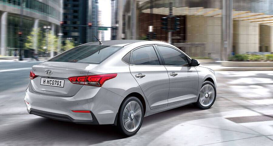 Is Hyundai Accent a Good Car for Uber? hc gallery right side rear view silver driving road pc