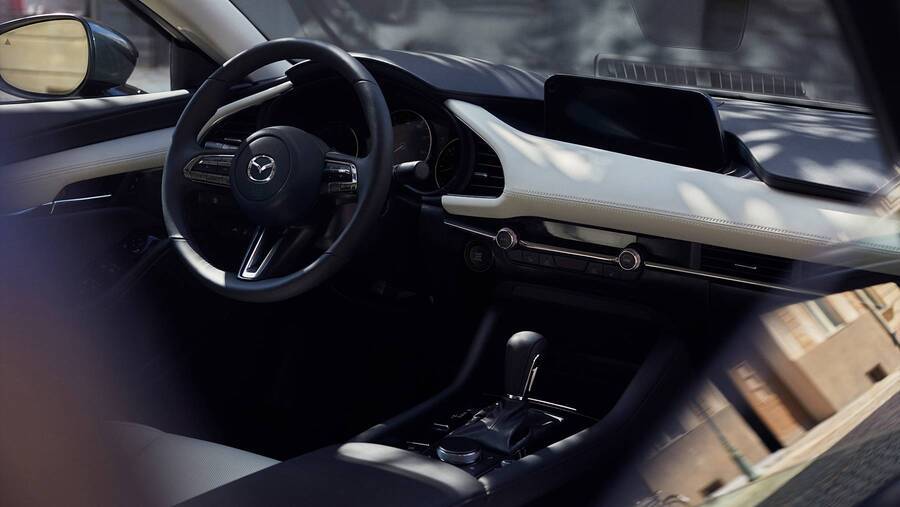 Is Mazda 3 a Good Car for Uber? mazda 3 sedan steering wheel 2
